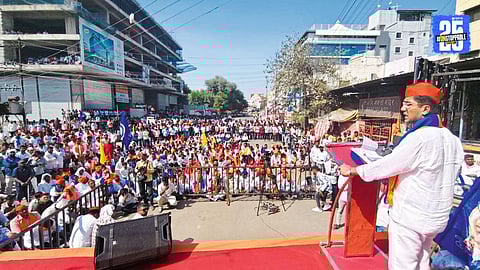 MLA Sangram Jagtap addressing a massive crowd during the Shivshakti–Bhimshakti Morcha in Ahilyanagar.