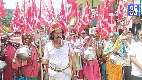 Adivasi protesters staging a Satyagraha at Shendi, warning the administration about closing Bhandardara Dam if their demands are ignored.