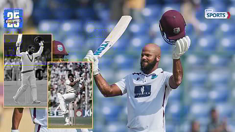 John Campbell celebrates his maiden Test century against India