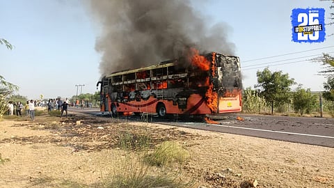 Burning passenger bus in Rajasthan’s Jaisalmer where a tragic fire claimed 15 lives — rescue teams on-site managing emergency relief.
