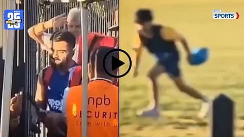 A young fan runs with joy after receiving Virat Kohli’s autograph