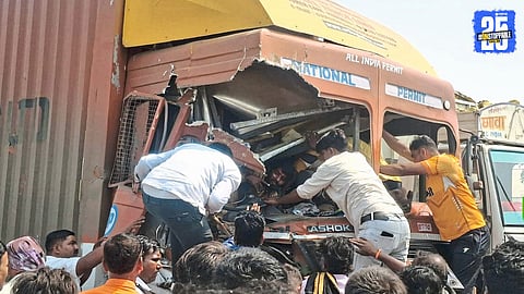 Truck narrowly avoids collision with stationary dumper on Solapur-Tuljapur road, thanks to alert citizens and driver vigilance.