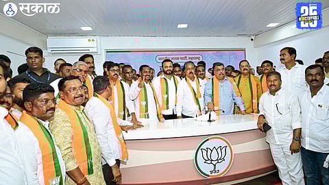 Nandkumar More and Balasaheb Sawant join BJP in presence of party leaders; major setback for NCP in Maan-Khatav.