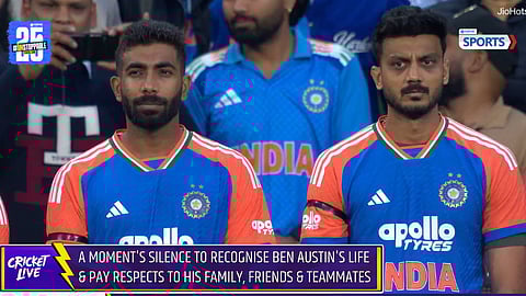 Indian and Australian players wear black armbands during the 2nd T20I to honour Ben Austin’s memory.