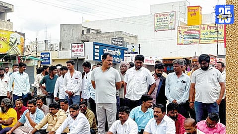 BJP workers protest on the highway after MLA Gopichand Padalkar’s development banner was torn in Sangli.