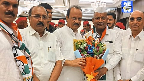 Former BJP MLA Balasaheb Murkute with Deputy CM Ajit Pawar after joining his camp, marking a major shift in Newasa politics.