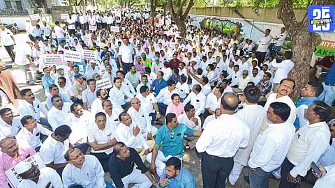 Teachers and education staff during the silent march outside Ahmednagar Collector Office opposing the TET policy.