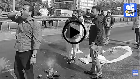 Citizens in Pune hold a symbolic funeral procession on Navale Bridge, protesting against frequent accidents and demanding immediate road safety action.