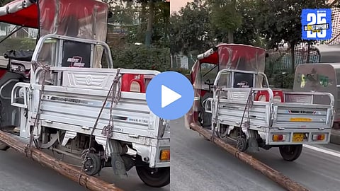 Driver uses a long wooden stick to replace a missing wheel, making the mini truck run smoothly on the road.
