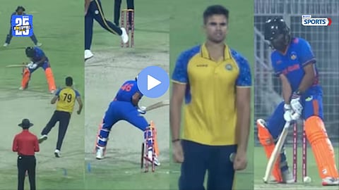 Arjun Tendulkar celebrates after clean bowling the Chandigarh batter with an unplayable delivery