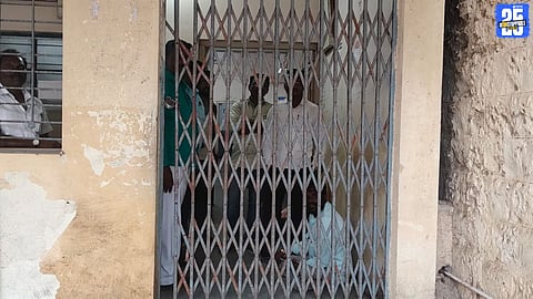 Manglavedha citizens protest delayed land records work; staff locked in office as anger erupts.