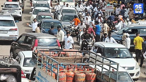 Heavy traffic and decorated wedding venues in Newasa during the peak wedding muhurat.
