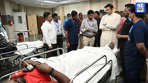 MLA Atul Bhosale meeting injured students at the hospital after the Karad accident.
