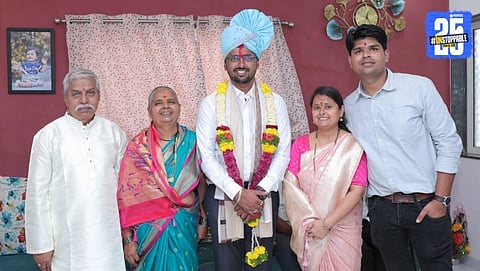 Vaibhav from Satara, son of a labourer, proudly holding his appointment order after becoming a Class-One officer.