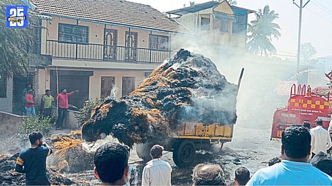 Tractor Carrying Grass Catches Fire