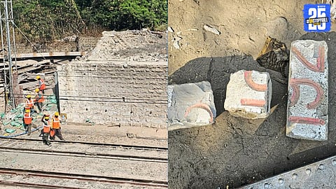 Historic stone secured near bridge site as demolition awaits railway clearance.