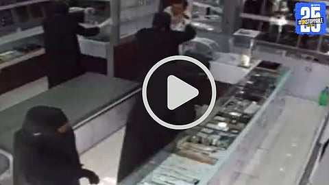 CCTV footage captures armed robbers looting a jewelry shop in Navi Mumbai during broad daylight, triggering panic and viral outrage on social media.