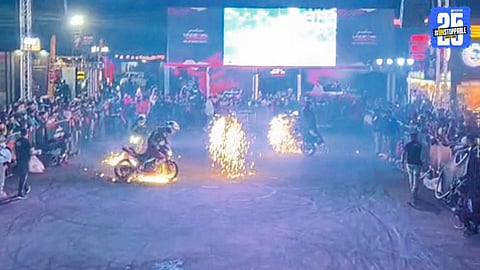 Bike riders performing breathtaking aerial stunts in the chilly weather of Panchgani.