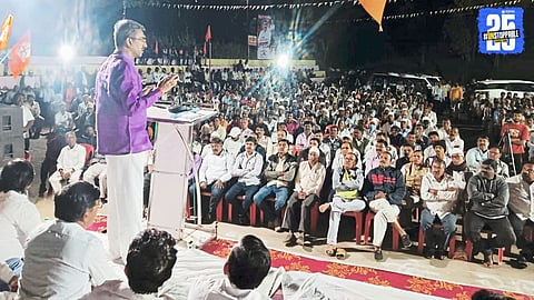 Minister Shambhuraj Desai addressing party workers with a confident political message.
