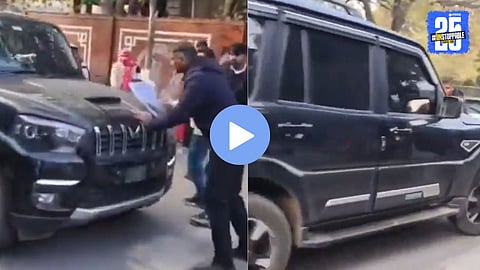 Police personnel investigating the spot near Bhilwara SP office where a woman was allegedly abducted in broad daylight using a black Scorpio.