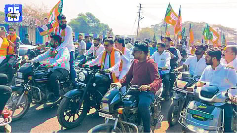 MLA Gopichand Padalkar leading a BJP bike rally during election campaigning in Sangli.