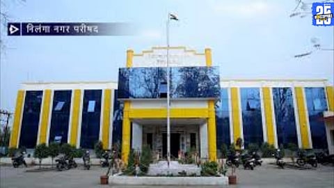 Party workers discussing strategies amid uncertainty over alliances in Nilanga taluka elections.