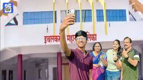 Voters queue up at a polling booth in Ichalkaranji during the city’s first municipal election amid tight security.