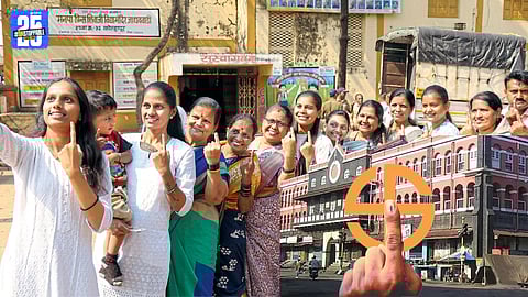 Voters queue outside a polling booth during the high-voltage Kolhapur municipal election.