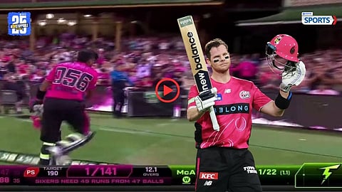 Steve Smith celebrates his match-winning century for Sydney Sixers in the Sydney derby.
