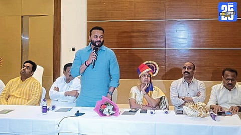 Guardian Minister Jaykumar Gore addressing corporators and officials during a review meeting.