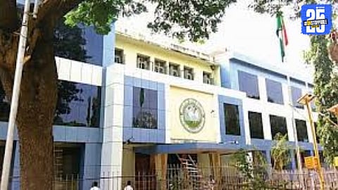 Election officials scrutinising nomination papers as Solapur district witnesses a crowded electoral contest.