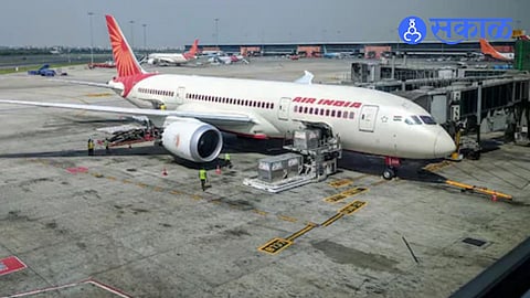 An Air India aircraft stationed on the runway after a fuel control switch malfunction was detected, leading to an immediate halt of the flight for safety inspection.