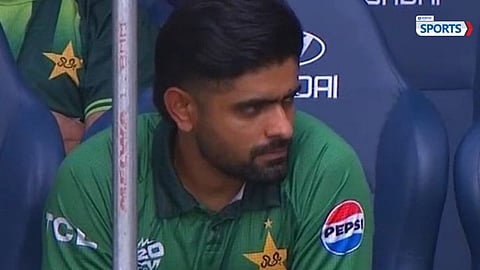 Babar Azam watches from the dressing room during the Pakistan vs Namibia T20 World Cup clash