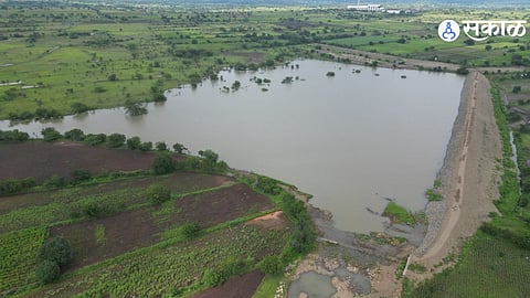 A completed percolation tank project contributing to irrigation in Solapur district.
