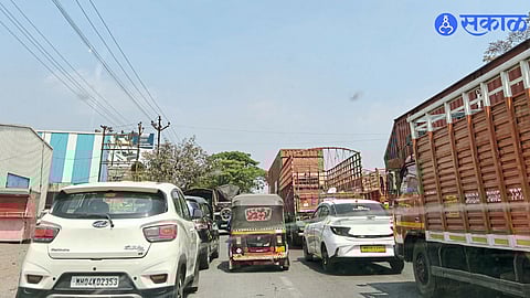 Long queues of vehicles stuck in traffic on the busy Chakan–Talegaon industrial stretch.