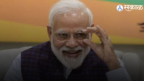 Prime Minister Narendra Modi celebrating a historic milestone after becoming the first global leader to cross 100 million followers on Instagram, surpassing Donald Trump and other world leaders.