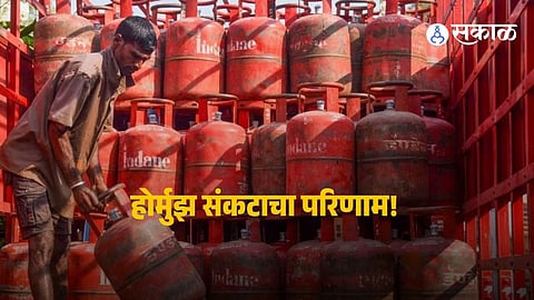 LPG cylinders stacked for distribution as global supply disruptions and rising prices impact gas consumption in India.