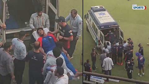 Delhi Capitals player being stretchered off after suffering a serious facial injury during practice
