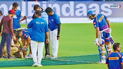Rohit Sharma rushes to check on a ground staff member