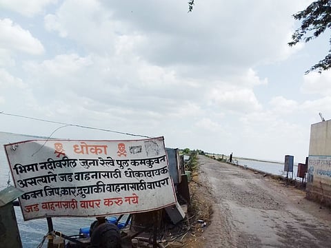 Demand for removal of fill on dikasl bridge