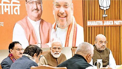 Narendra Modi along with other leaders at a meeting 