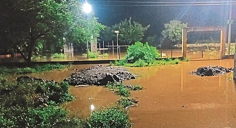 A boy Fell down from his father's shoulders; Seven-year-old boy dies in flood waters at Langare