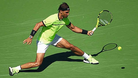 कॅलिफोर्निया - इंडियन वेल्स स्पर्धेत अर्जेंटिनाच्या गुईडो पेलाविरुद्ध परतीचा फटका मारताना स्पेनचा रॅफेल नदाल.