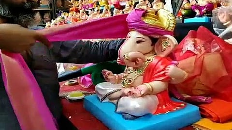 new trend of wearing various feta on ganesh murti in belgaum