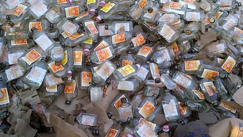 Wine smugglers fall down with wine on road 