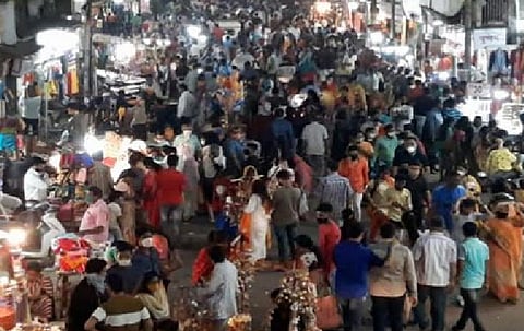 people crowd at market in amravati