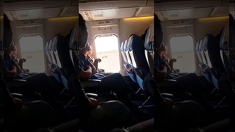 Plane passenger opens emergency exit for a breath of fresh air