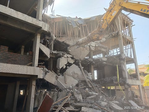 A four-storey building constructed illegally in Santnagar area of ​​Lohgaon on Saturday has been demolished by the Municipal Corporation..jpg