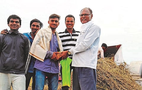 A doctor in the Philippines works at a soybean mill in Shirdi