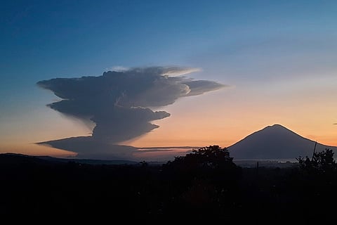 Volcanic eruption in Indonesia forces evacuations, flight cancellations
